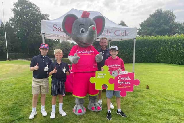 Josh Faulkner (right) at a Team Josh fundraiser for Candlelighters.