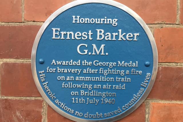 The blue plaque honouring Ernest Barker.