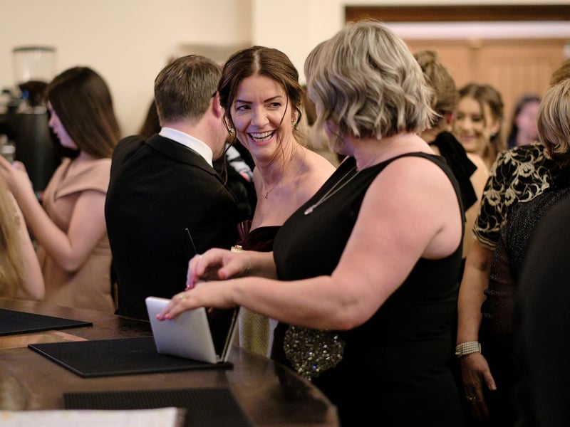 Parents arrive for the black tie lol.