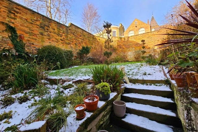 The charming walled rear garden.