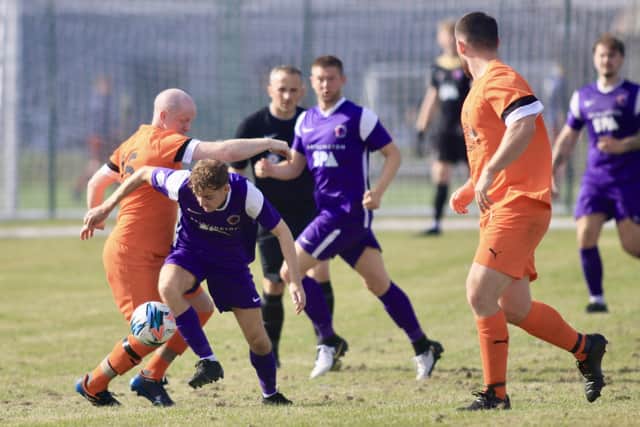 Edgehill, orange kit, won 3-2 at Brid Spa. Photo by TCF Photography