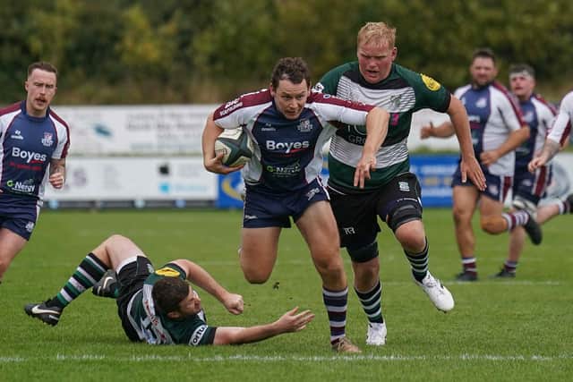 TJ Hodgson charges forward for the home side. Photo by Charlie Hopper