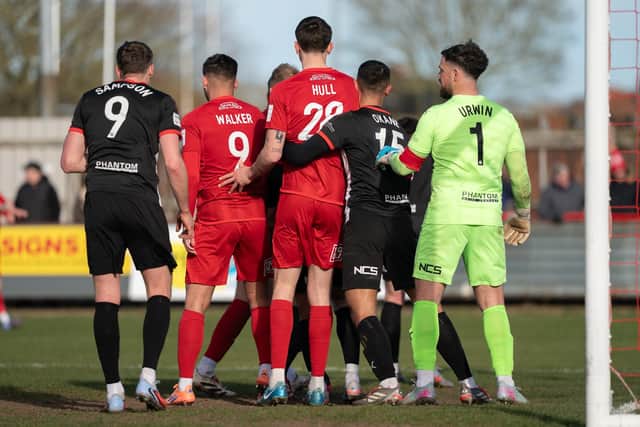 Chorley get to grips with Boro defender Jake Hull at a corner. Photo by Wandering Photography