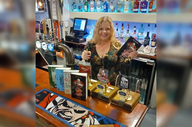 Lena Pennington, of the Old Ship Inn, celebrates the fourth consecutive year of featuring in the CAMRA 'Good Beer Guide'. Photo courtesy of Mark Pennington.