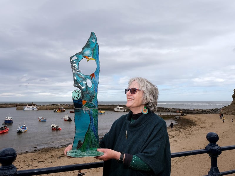 Artist Nick Claiden with a lovely glass sculpture.