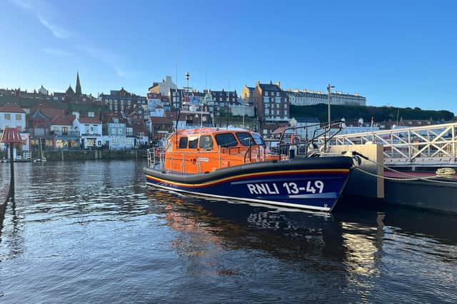 Whitby lifeboat crew were stood down after an off duty crew member assisted the casualty to safety - Image RNLI/Richard Dowson