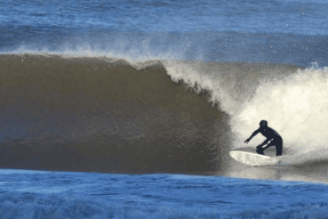 Surfing the waves! Courtesy Secret Spot Surf Shop