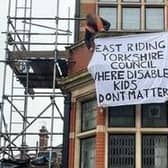 A man protesting on the roof of County Hall, Cross Street, Beverley, on Wednesday, April 3. Picture submitted.