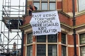 A man protesting on the roof of County Hall, Cross Street, Beverley, on Wednesday, April 3. Picture submitted.