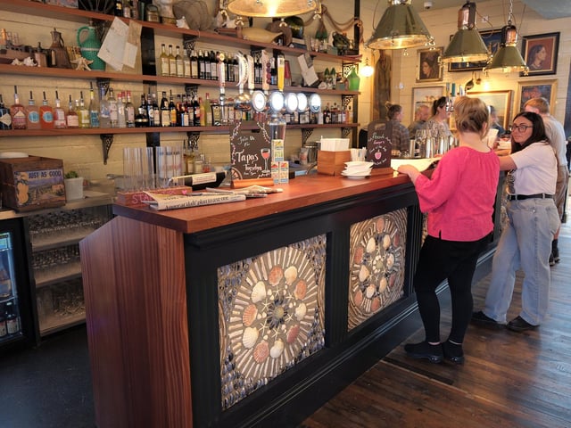 People enjoying a drink at the bar.picture: Richard Ponter