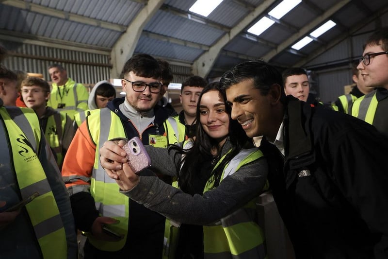 The Prime Minister was in a few selfies with the apprentices at the Construction Skills Village.  Picture by Simon Dawson / No 10 Downing Street.