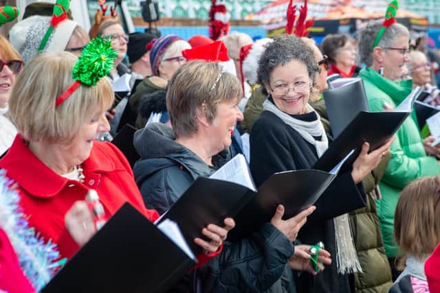 Carol singers add a festive touch