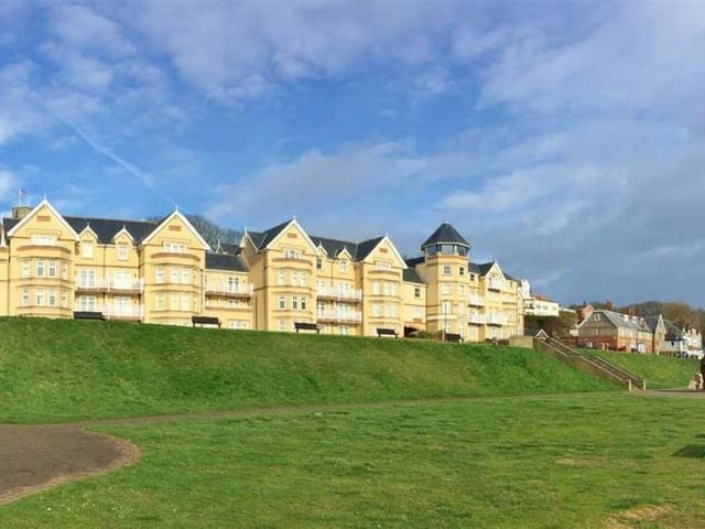 The apartment is housed within a stunning beach-front building and is for sale with no onward chain.