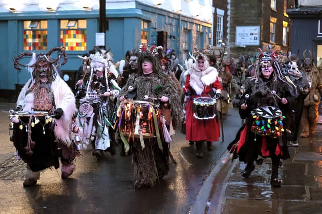 The Whitby Krampus Run parade on Baxtergate in 2024, which has hit - but not stopped by - Storm Daragh. photo: Richard Ponter