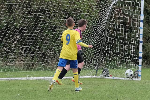 Seamer Under-12s, yellow and blue kit, on target during their home match against Heslerton PHOTOS BY RICHARD PONTER
