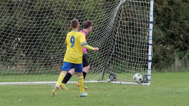 Seamer Under-12s, yellow and blue kit, on target during their home match against Heslerton PHOTOS BY RICHARD PONTER
