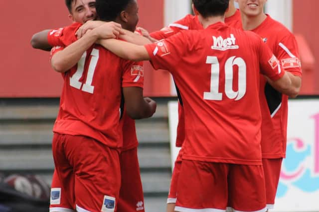 Ali Aydemir celebrates his second goal with his team mates