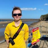 Sarah at Sandsend Beach advising people to swim in between the red and yellow flags - Image:RNLI