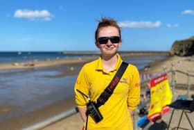 Sarah at Sandsend Beach advising people to swim in between the red and yellow flags - Image:RNLI