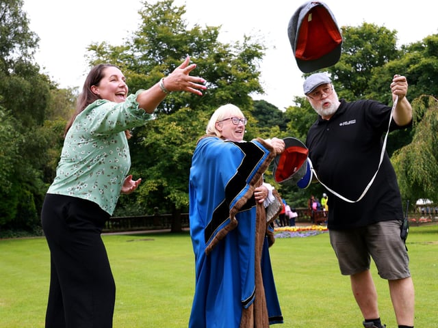 Marie Gascoigne Cllr Linda Bayram and Robert Chester keeping an eye on the record during the Flat Cap throwing.