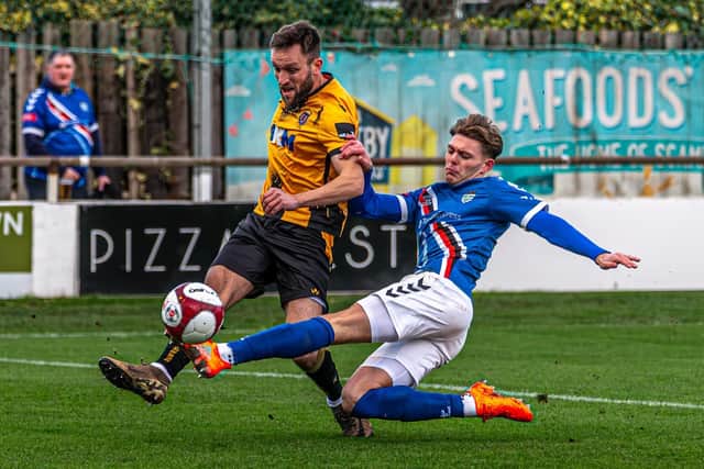Jake Charles gets stuck in for the Seasiders at home to Morpeth Town. Photo by Brian Murfield