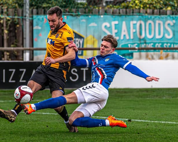 Jake Charles gets stuck in for the Seasiders at home to Morpeth Town. Photo by Brian Murfield
