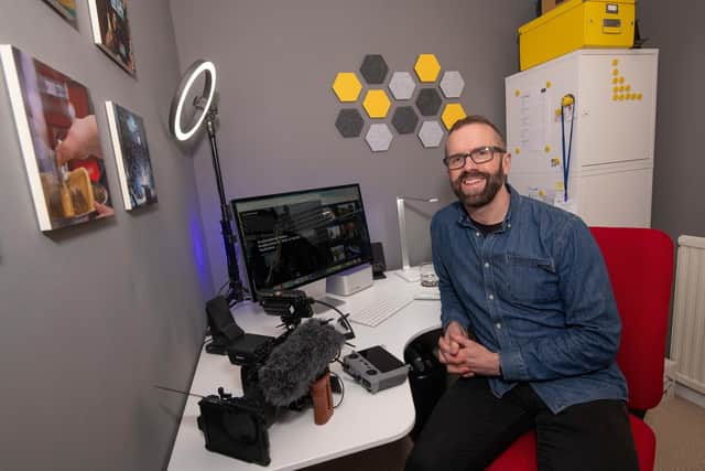 Alex Brown with his new videography equipment.