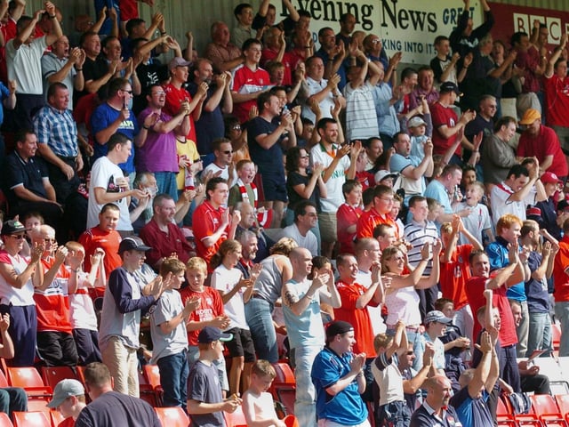 Do you recognise any of the fans celebrating in the Boro crowd after the hosts score against Woking in August 2004?