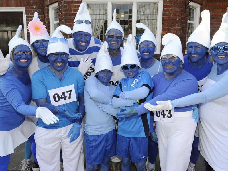 Local lady Jean Beaver (front, 2nd right) was joined in the walk by family members, in Smurf costume, from all around the country.