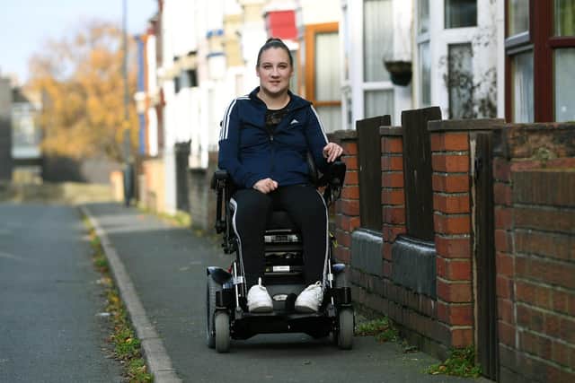Tiffany Pearson from Whitby, who was paralysed at 18, by a narrowing of her spinal cord.