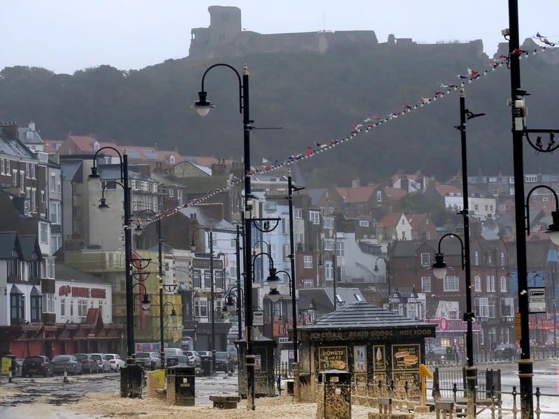 Foreshore Road has been affected dramatically by the storm, with waves washing onto the road and pavement.