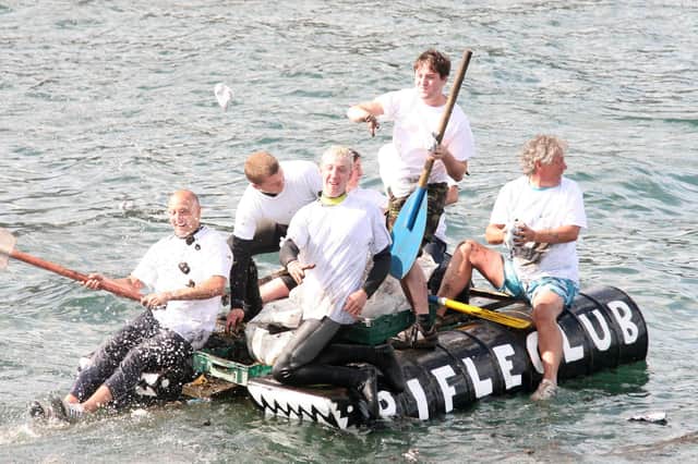 The Rifle Club team have fun in the Whitby Regatta raft race.