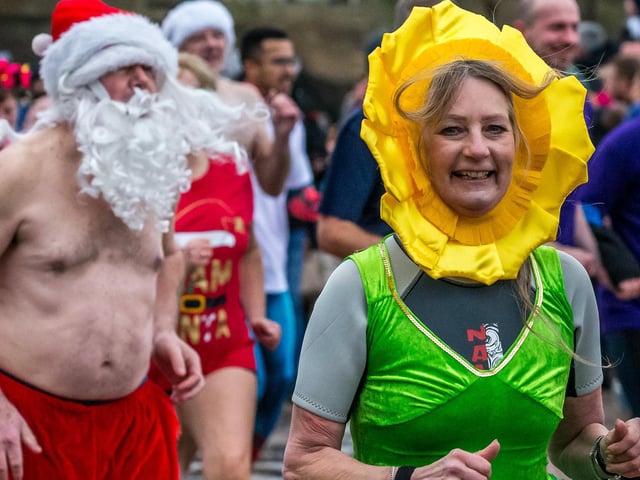 Boxing Day dippers in fancy dress.
picture: Brian Murfield.