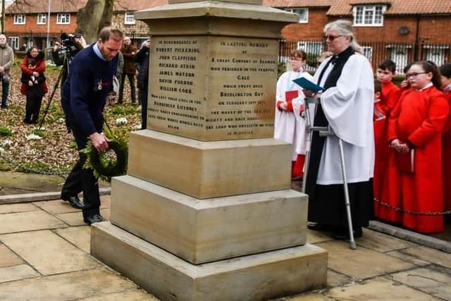 : Bridlington RNLI Coxswain, Steve Emmerson, lays a wreath at the Great Gale memorial at last years service. Photo: RNLI/MIke Milner