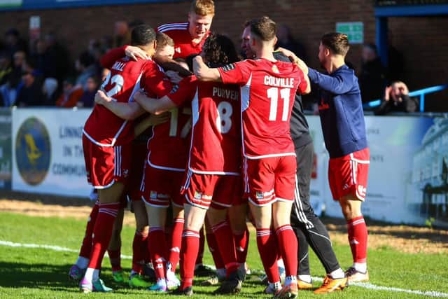 Boro players celebrate the win.