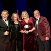 L to R MC Nigel Barden, award sponsor Louise Rogers from Spencer Churchill, mandy and Karl Avison