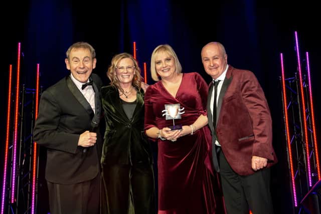 L to R MC Nigel Barden, award sponsor Louise Rogers from Spencer Churchill, mandy and Karl Avison