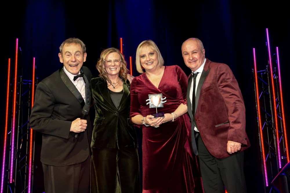 L to R MC Nigel Barden, award sponsor Louise Rogers from Spencer Churchill, mandy and Karl Avison