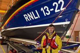Jason Webber at the Bridlington RNLI station in all of his gear.