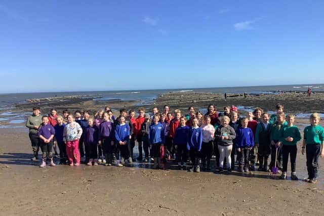 Pupils' fun on the beach at Robin Hood's Bay.