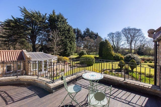 Views over a stunning garden from this balcony terrace.