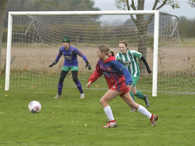 Scarborough Ladies Under-15s' Ruby Carney pushes on against Wigginton Grasshoppers