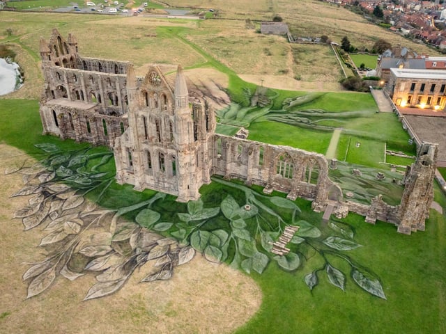 Aerial views of a 5,400 square metre land-art installation created by MTArt artist David Popa as it is unveiled at Whitby Abbey, paying homage to seven Heritage ‘Game Changers’ from across the UK.