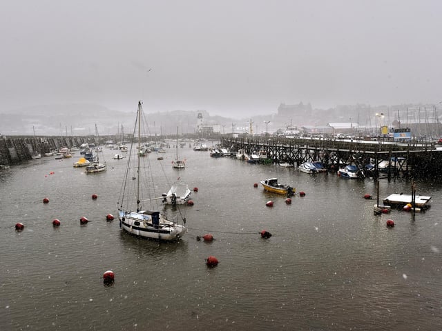 The harbour bathed in wintery gloom