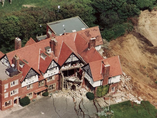 The hotel disappears down the cliff.