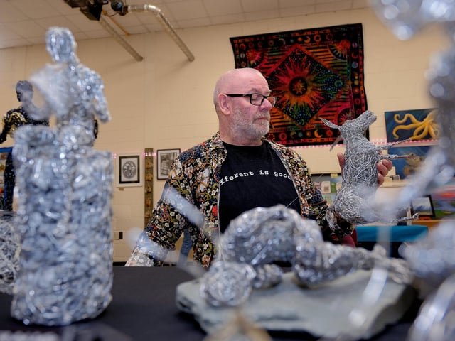 Bob Tuffin works on his latest design
