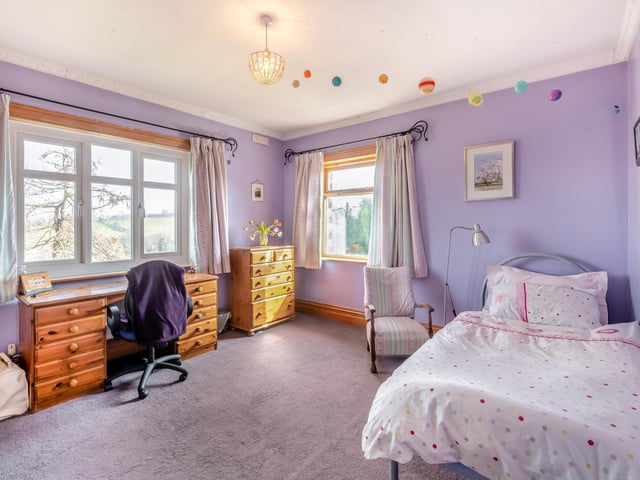 A further bedroom with lovely views from its windows