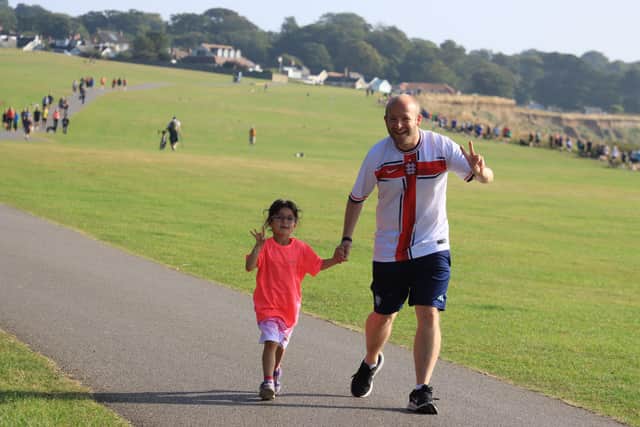 Brid Road Runner Luke Duffill with his daughter Ivy. PHOTOS BY TCF PHOTOGRAPHY