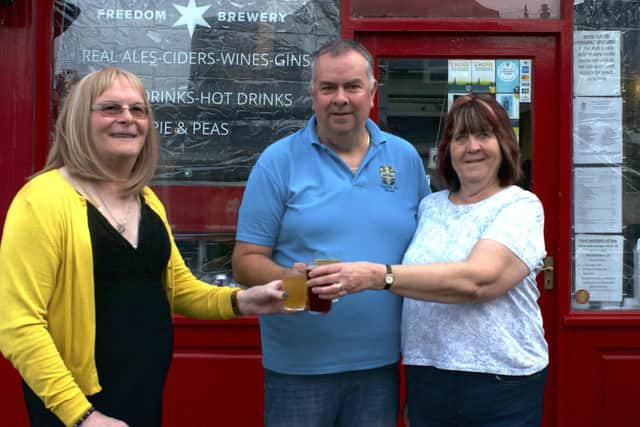 Celebrating outside the Three B's micropub.