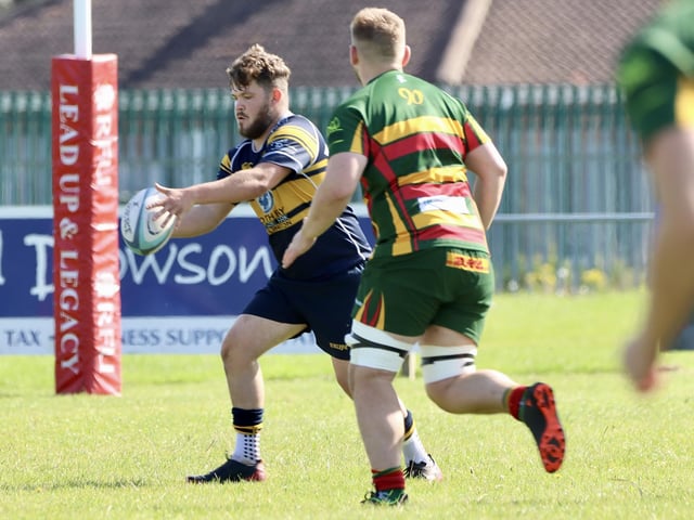 A Bridlington RUFC player looks for an option.